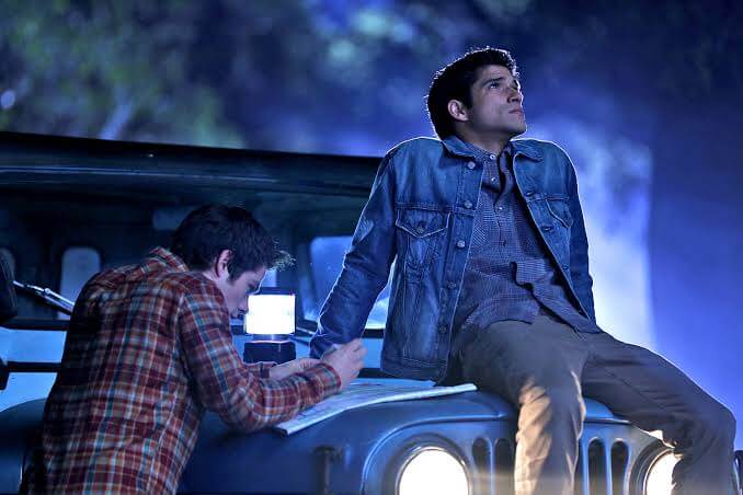 Best friends a lead characters of teen wolf seem to enjoy quality time under a night sky.