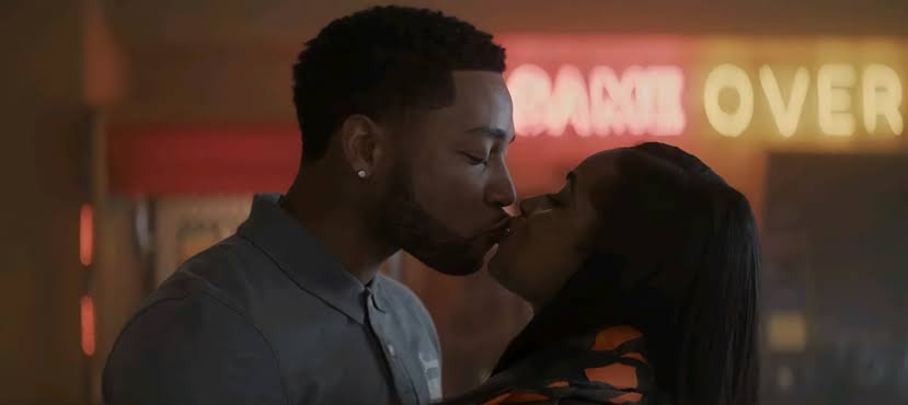 The two main love interest of the show are seen kissing each other.