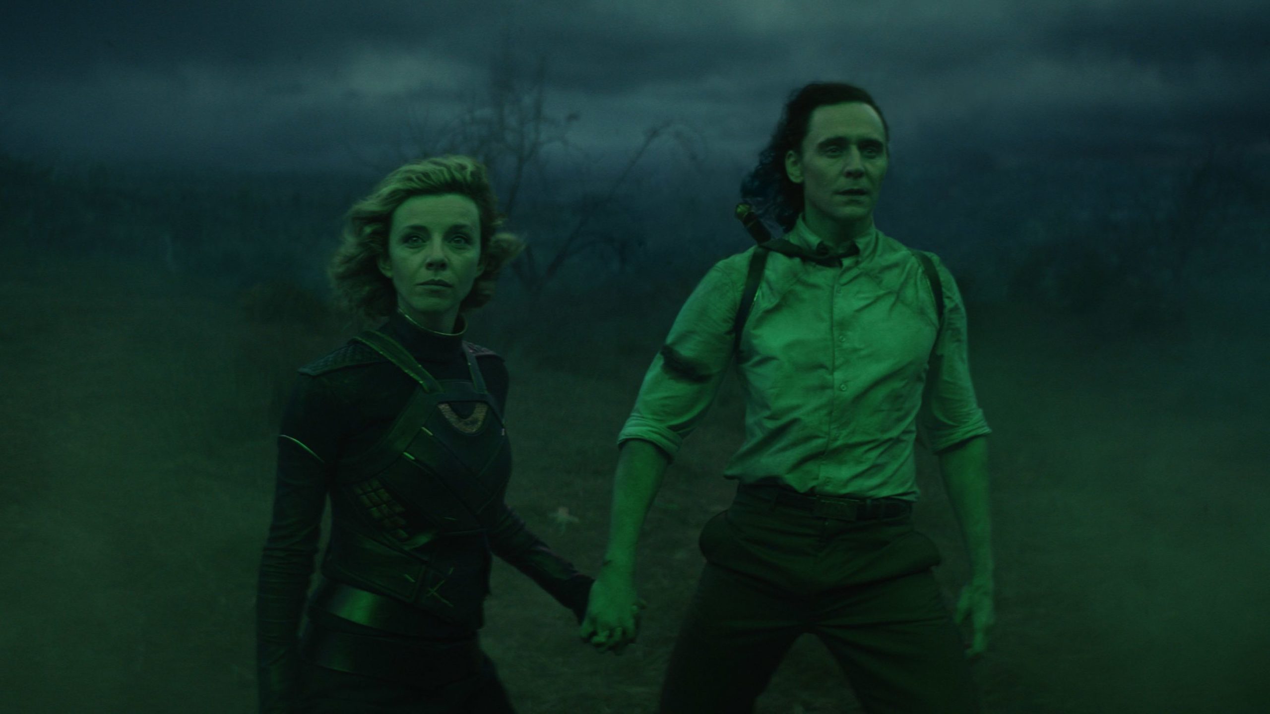 Loki and Sylvie holding hands
