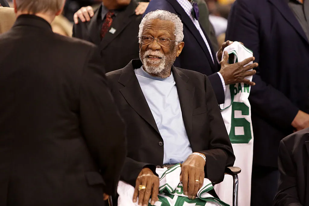 Bill Russell looking at someone and smiling