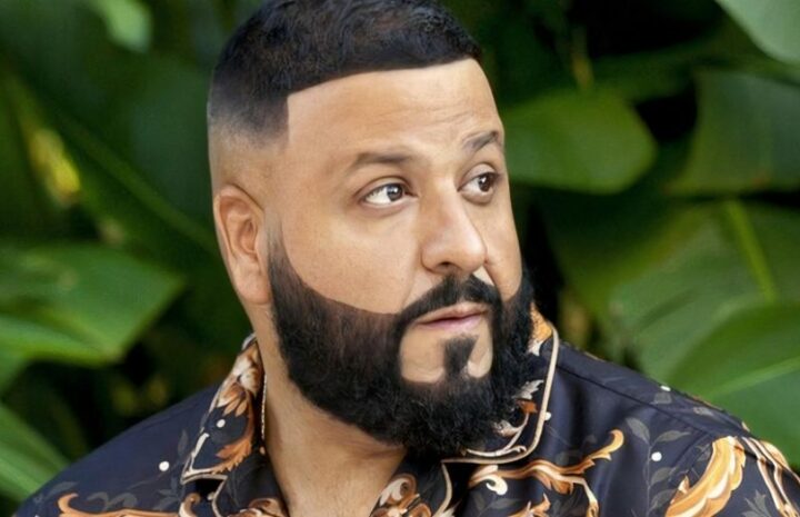 DJ Khaled is looking at someone