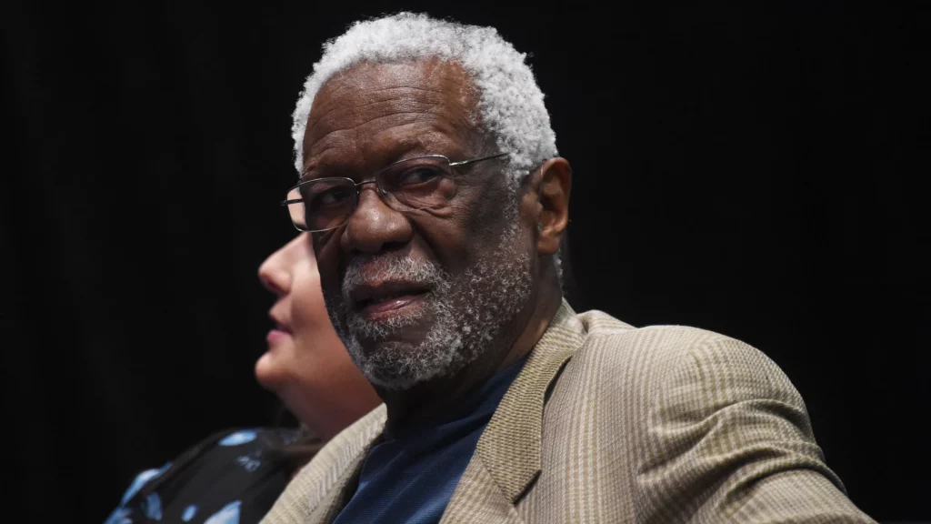 Bill Russell smiling while looking at camera