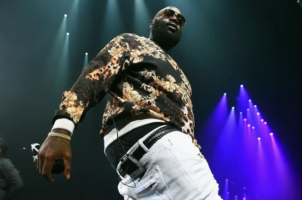 Rick Ross onstage during performing