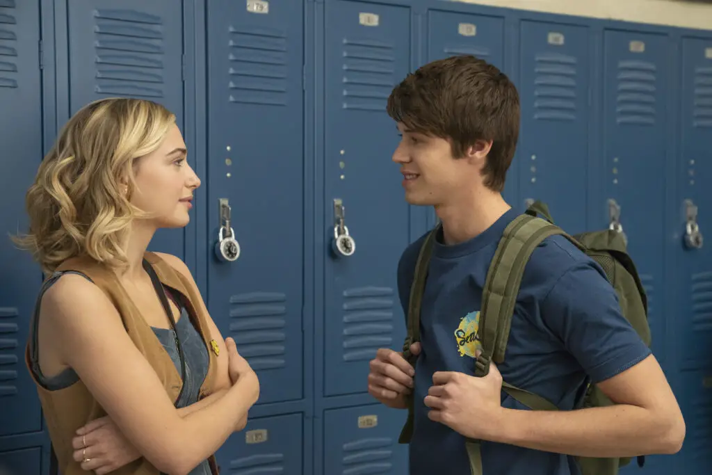 Two students talking by their lockers