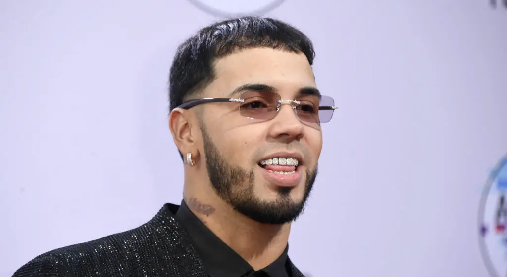 Anuel AA is smiling