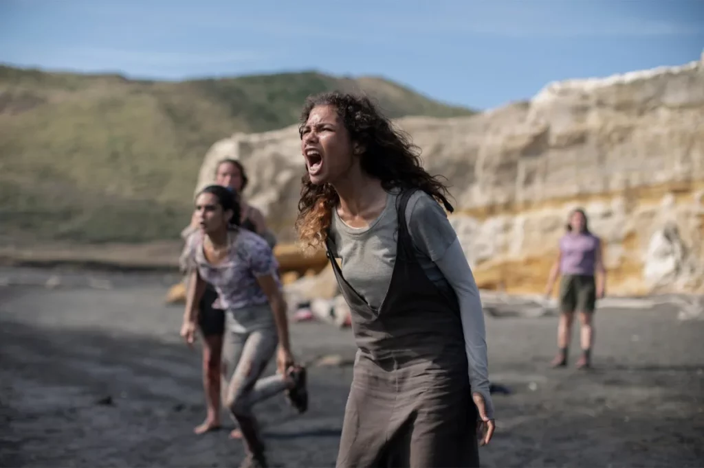 The girls screaming for help while they are stranded on the island 