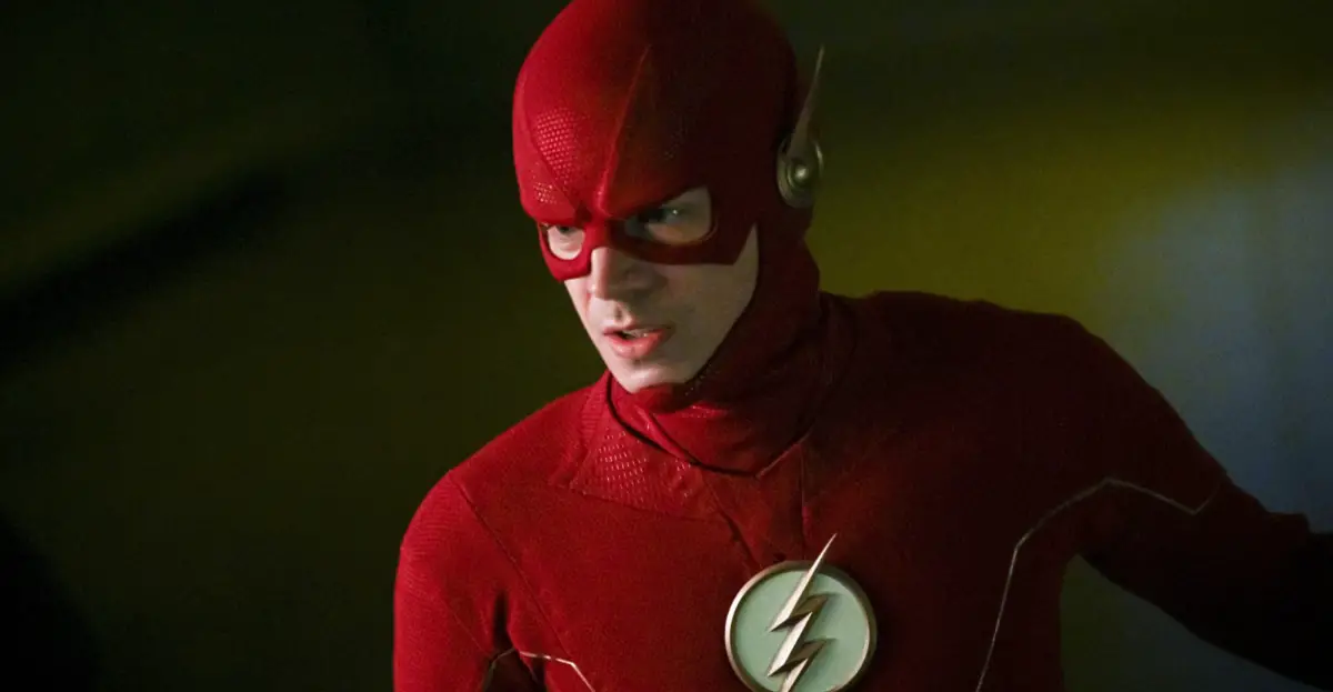 The lead character The Flash is looking at someone.